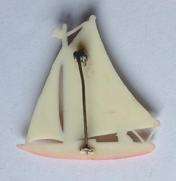 vintage celluloid yacht brooch